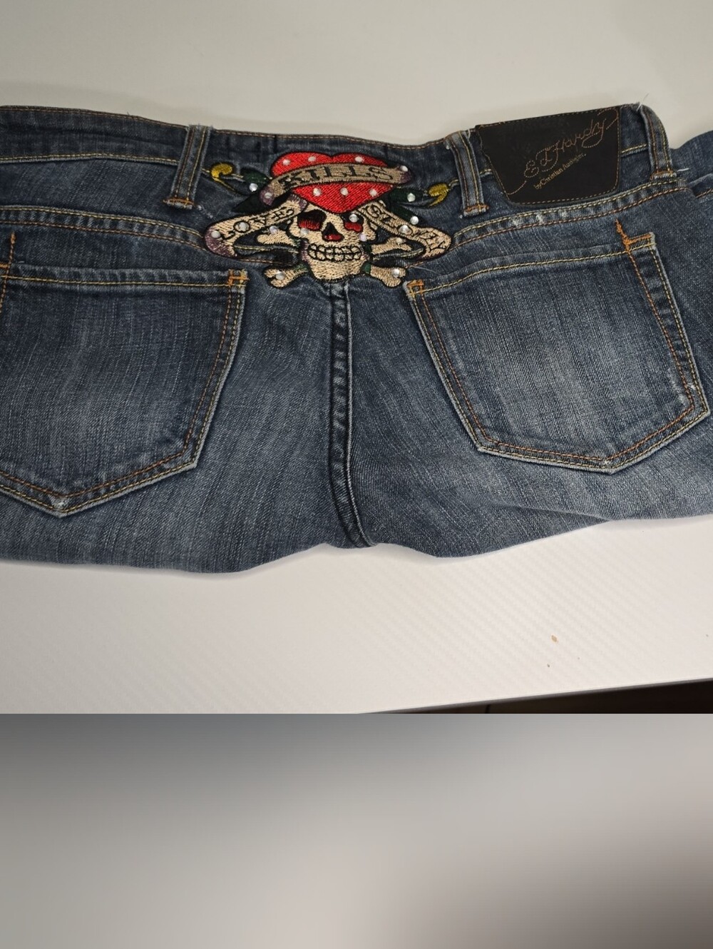 Ed Hardy Women's Blue Denim Straight Leg Jeans with Red Skull Embroidery